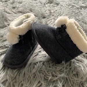 Grey boots with cream fuzzy trim